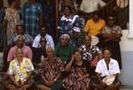 Atafu Taupulega (Elders' Council) and their wives on steps of new Lootala