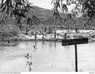 SALAMAUA AREA, NEW GUINEA. 1943-09-20. THE CROSSING OVER THE FRANCISCO RIVER, SOUTH OF THE AIRSTRIP IN THE 312TH AUSTRALIAN LIGHT AID DETACHMENT AREA