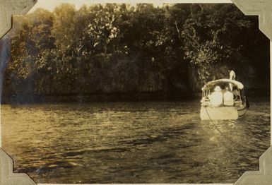 Boat approaching Swallows Cave, Kapa Island, 1928