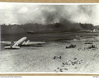 NADZAB, NEW GUINEA. 1943-09-20. TRANSPORT AIRCRAFT JUST TAKING OFF FROM NO. 1 AIRSTRIP