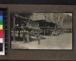 Children seated outside houses, Mailu, Papua New Guinea, ca.1905