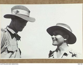 WARD'S DROME, NEW GUINEA. 1943-11-16. NX14337 LIEUTENANT J. T. SCOTT (LEFT) AND NX70703 LIEUTENANT G. W. KERRUISH (RIGHT), BOTH OF THE 2/5TH AUSTRALIAN FIELD REGIMENT, 7TH AUSTRALIAN DIVISION