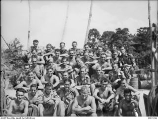 SORAKEN AREA, BOUGAINVILLE, 1945-06-12. PERSONNEL OF THE NORTHERN DETACHMENT OF 42 LANDING CRAFT COMPANY, WHICH PARTICIPATED IN THE EVACUATION OF PORTON PLANTATION. A FEW MEMBERS ARE ABSENT ON ..