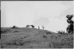 Megiranu, Wanuma Census Division: carriers on trail, followed by Pete Vayda