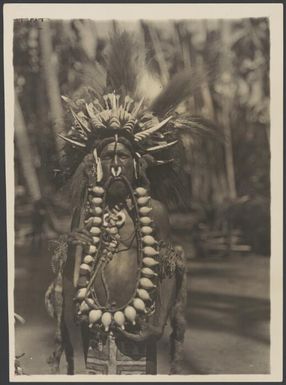 Chief wearing official dress, Eroro village, Oro Bay, Papua New Guinea, ca. 1922 / Frank Hurley