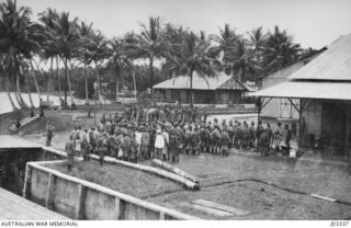 MADANG, NEW GUINEA, 1914. A NAVAL CONTINGENT, MEMBERS OF THE AUSTRALIAN NAVY AND MILITARY EXPEDITIONARY FORCE (AN&MEF), UNDER THE COMMAND OF LIEUTENANT COMMANDER LEIGHTON S. BRACEGIRDLE AND ..