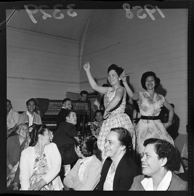 Cook Island women dancing, location unknown