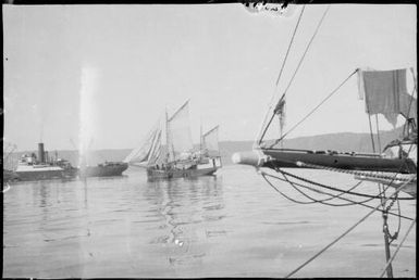 Ship's bowsprit and two other ships in the background, Rabaul Harbour, New Guinea, ca. 1929 / Sarah Chinnery