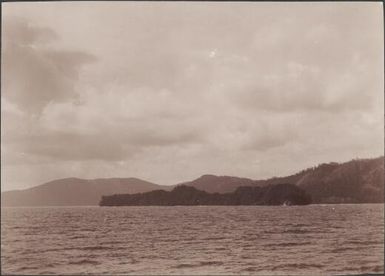 The island of Mara-na-tabu off the coast of Ysabel, viewed from the south, Solomon Islands, 1906 / J.W. Beattie