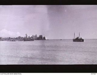 LAE, NEW GUINEA. 1943-10-04. SHIPPING TIED UP DURING THE EARLY STAGES OF THE HARBOUR DEVELOPMENT