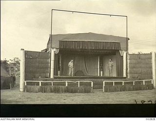 AITAPE, NORTH EAST NEW GUINEA. C. 1945. THIS IS THE OPEN AIR STAGE BUILT OF WASTE CASES AND SCRAP BY THE BOYS OF A RAAF BEAUFORT BOMBER SQUADRON. THE PLANS WERE DRAWN UP BY LEADING AIRCRAFTMAN JOHN ..