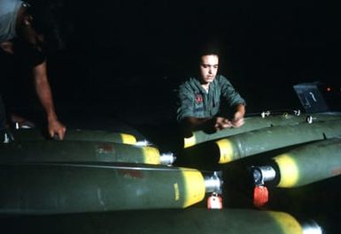 Members of the 3rd Munitions Maintenance Squadron attach safety wires to Mark 82 500-pound laser-guided bombs during Exercise Opportune Journey 4