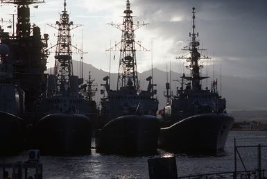 Three Canadian frigates are docked in the harbor during Exercise RimPac '88