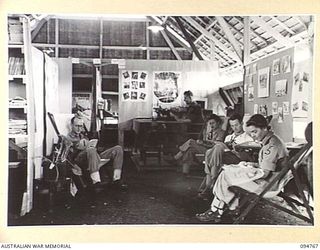 LAE AREA, NEW GUINEA, 1945-08-10. THE INTERIOR OF THE EDUCATION CENTRE, 2/7 GENERAL HOSPITAL, UNDER THE COMMAND OF THE DEPUTY ASSISTANT DIRECTOR OF EDUCATION, LAE BASE SUB-AREA