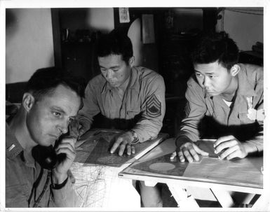 Nisei technicians working on calculations