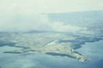 [Aerial view of] south coast Papua, showing grass fire, [Papua New Guinea], 1958