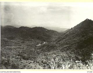 YAULA, NEW GUINEA. 1944-04-09. BOGADJIM VIEWED FROM A TURN IN THE BOGADJIM ROAD NEAR YAULA DURING THE ADVANCE ON THE 57/60TH INFANTRY BATTALION