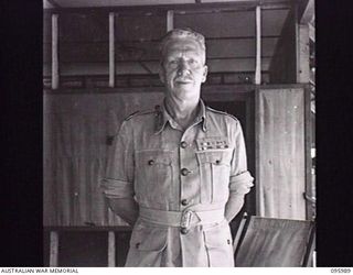 CAPE WOM, WEWAK AREA, NEW GUINEA. 1945-09-01. MAJOR GENERAL H.C.H. ROBERTSON, GENERAL OFFICER COMMANDING 6 DIVISION AT HEADQUARTERS 6 DIVISION