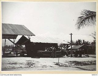 WUNUNG PLANTATION, JACQUINOT BAY, NEW BRITAIN, 1945-08-24. A BOAT ENGINE BEING TESTED BY PERSONNEL OF LIGHT AID DETACHMENT SECTION, ATTACHED 55 FIELD PARK COMPANY ROYAL AUSTRALIAN ENGINEERS