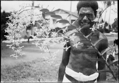 Malowa with orchids, Salamaua, New Guinea, ca. 1933 / Sarah Chinnery