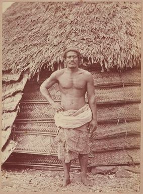 Man standing outside fale. From the album: Tahiti, Samoa and New Zealand scenes
