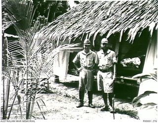 THE SOLOMON ISLANDS, 1945-10. TWO JAPANESE OFFICERS AT THEIR INTERNMENT CAMP. (RNZAF OFFICIAL PHOTOGRAPH.)