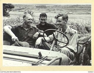 KELANOA, NEW GUINEA. 1944-01-20. THREE RHODES SCHOLARS OF THE 9TH DIVISION. THEY ARE:- VX46337 LIEUTENANT COLONEL J.H. CHINNER, ASSISTANT DIRECTOR OF ORDNANCE SERVICES, 9TH DIVISION (1); SX5467 ..