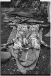 Bride price for Maima, food preparation: butchered pork being cut up to include as part of bride price payment