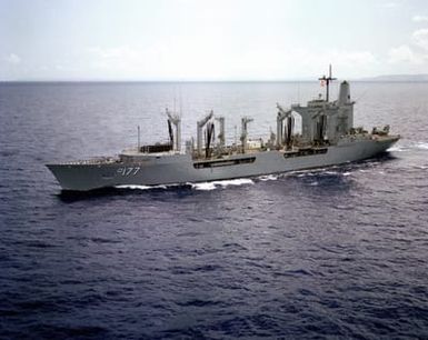 A port view of the fleet oiler USS CIMARRON (AO 177) underway