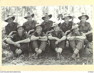 SIAR PLANTATION, MADANG, NEW GUINEA. 1944-06-20. NON COMMISSIONED OFFICERS OF THE 3RD SUPPLY DEPOT PLATOON. IDENTIFIED PERSONNEL ARE:- VX113700 SERGEANT J.B. WHITE (1); VX87694 WARRANT OFFICER II, ..