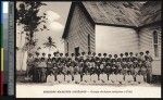 Over sixty indigenous sisters in front of a church, Fiji, ca.1900-1930