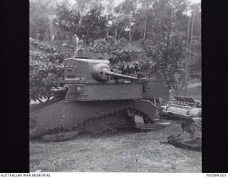 PORT MORESBY, PAPUA NEW GUINEA. 1973. A GENERAL STUART M3 LIGHT TANK SALVAGED FROM THE BUNA BATTLEFIELD SITE. IT WAS POSSIBLY KNOCKED OUT BY ANTI TANK FIRE IN AN 18TH BRIGADE ATTACK OF 1942-12-24. ..