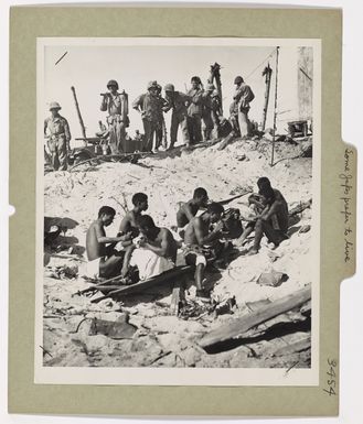 Photograph of Japanese Prisoners of War Awaiting Transfer to Coast Guard-manned Transport