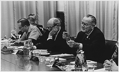 Honolulu Conference: Secretary of State Dean Rusk and President Lyndon B. Johnson at the table