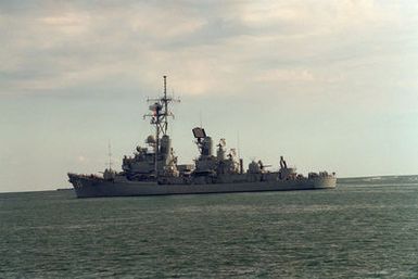 The guided missile destroyer USS GOLDSBOROUGH (DDG-20) departs from the naval station after a visit