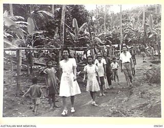 RABAUL AREA, NEW BRITAIN. 1945-09-13. CHINESE CIVILIANS, INTERNED BY THE JAPANESE AT A CAMP 15 MILES WEST OF RABAUL, WERE CONTACTED BY A PARTY OF AUSTRALIAN ARMY AND RED CROSS OFFICIALS SOON AFTER ..