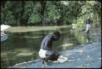 Man working at shore