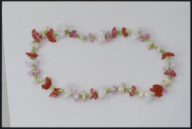 Flower lei and hibiscus flower