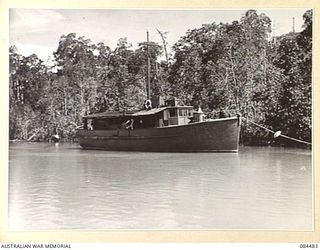 LAE, NEW GUINEA. 1944-12-18. THE AS 11, A DIESEL LAUNCH OF 130 TONS DEAD WEIGHT, OPERATED BY 12 SMALL SHIP COY. THE LAUNCH, IMPRESSED IN AN UNFINISHED CONDITION AT LA PEROUSE, SYDNEY, MEASURED 70 ..