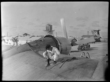 [Refuelling?] an aeroplane, Canton Island, Republic of Kiribati