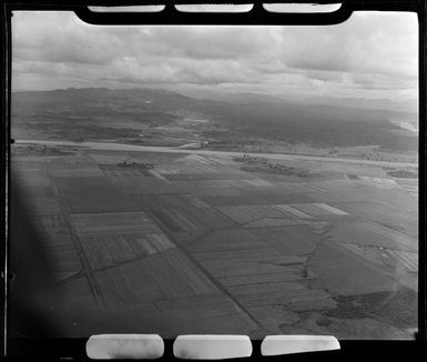 Nausori, Suva, Fiji, showing sugarcane fields and Rewa River