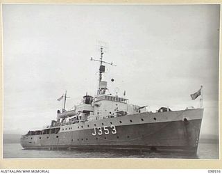 NAMATANAI, NEW IRELAND. 1945-10-29. RAN VESSEL HMAS KIAMA (J353) AT ANCHOR. THE KIAMA BROUGHT THE AUSTRALIAN NEW GUINEA ADMINISTRATIVE UNIT DETACHMENT TO THE AREA. AN ANGAU ADMINISTRATIVE ..