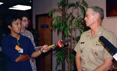 US Navy Admiral (ADM) Joseph W. Prueher, Commander in CHIEF U.S. Pacific Command, talks with members of Guam's media at Andersen AFB, Guam, during OPERATION PACIFIC HAVEN. Pacific Haven, a joint humanitarian operation conducted by the U.S. Military, evacuated over 2,100 Kurds from Northern Iraq. The evacuees will be housed temporarily at Andersen AFB, Guam, while they go through the immigration process for residence into the United States