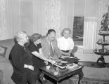 Mr. and Mrs. Glenn Iungerich visit with family in Bloomington IL from Guam, 1949