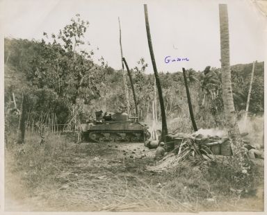 Marines advancing aided by tank