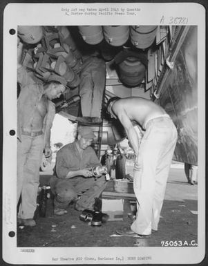 Bombs Are Loaded Into The Bomb-Bay Of A Boeing B-29 Of The 314Th Bomber Wing, North Field, Guam, For A Mission Over Tokyo. 13 April 1945. (U.S. Air Force Number 75053AC)