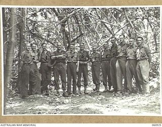 NEW GUINEA. 1943-11-28. STAFF OFFICERS OF HEADQUARTERS, 24TH. AUSTRALIAN INFANTRY BRIGADE. THEY ARE LEFT TO RIGHT:- WX5268. CAPTAIN H. J. C. NORRIS. STAFF CAPTAIN LEARNER.: SX9479. CAPTAIN J. H. ..