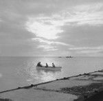 Four men on skiff, Bikini Atoll