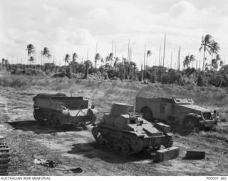 NEW BRITAIN, 1945-09. THREE DIFFERENT JAPANESE ARMOURED VEHICLES PARKED ON THE GAZELLE PENINSULA. (RNZAF OFFICIAL PHOTOGRAPH.)