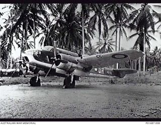 MILNE BAY, PAPUA, 1943-05. BRISTOL BEAUFORT BOMBER NO. A9-193 OF NO. 100 SQUADRON RAAF ON THE STRIP AT GURNEY AIRFIELD. PAINTED ON THE NOSE SECTION OF THE AIRCRAFT IS A CARTOON OF A TORPEDO ..